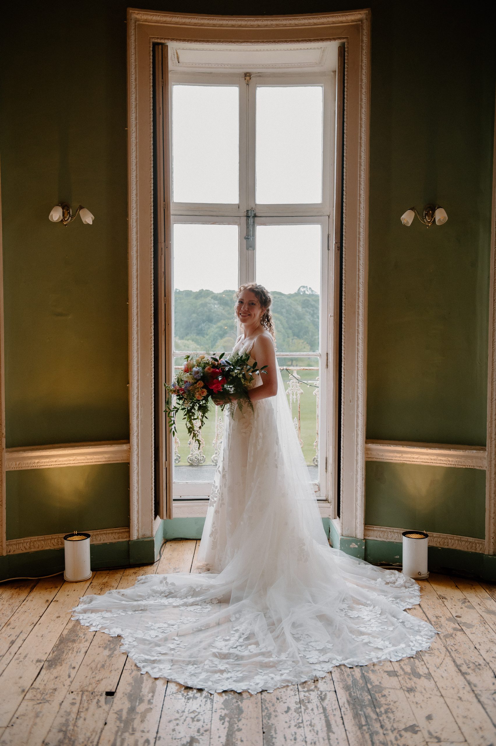 Bride at Beckenham Place Mansion with bouquet by Just So Flowers