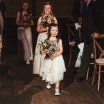 Bridesmaids at Wilton's Music Hall with Flowers by Just So Flowers