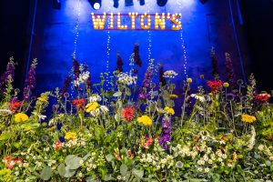 Stage flowers for Wilton's Music Hall by Just So Flowers