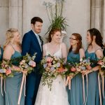 Alana and Tom with bridesmaids and Flowers by Just So Flowers