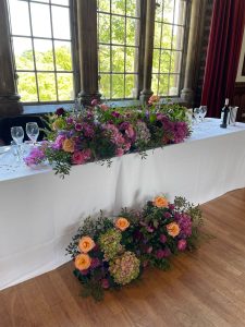 Top table flowers by Just So Flowers for Dulwich College Events by