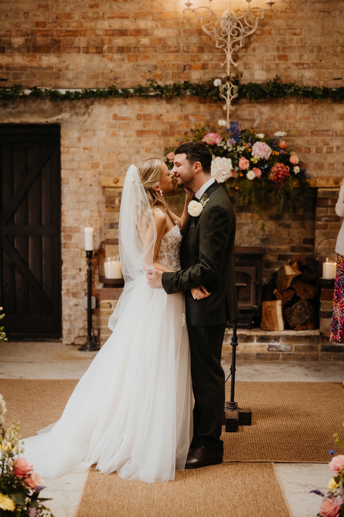 Bride and groom at Botley Hill Barn with Flowers by Just So Flowers